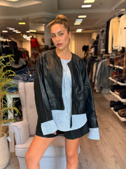 ג׳קט דמוי עוד בשילוב מכופתרת